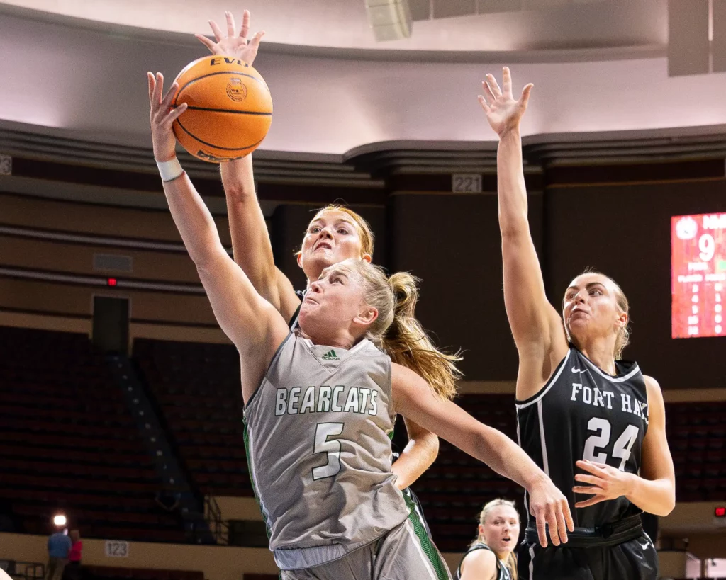 Bearcat women's basketball guard Molly Hartnett goes for a shot during the MIAA Tournament Semifinals.